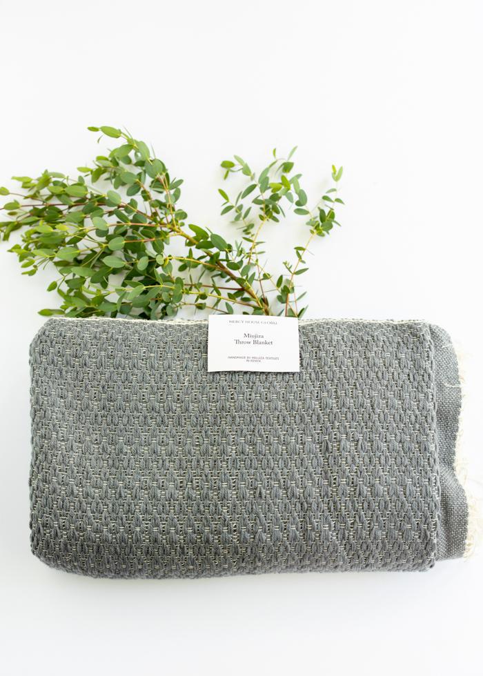 Miujiza Throw Blanket | 68" x 44"